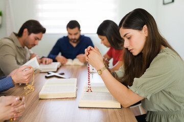 Young woman studying the holy scriptures