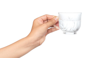 Sticker - hand holding a glass with water isolated on a white background