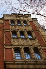 old brick building with bas-reliefs Saint Petersburg