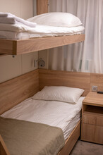 Bunk Bed In A Cabin On A River Cruise Ship. Interior Cabin On A River Cruise Ship