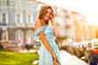 Lifestyle fashion summer portrait of elegant young magnificent model