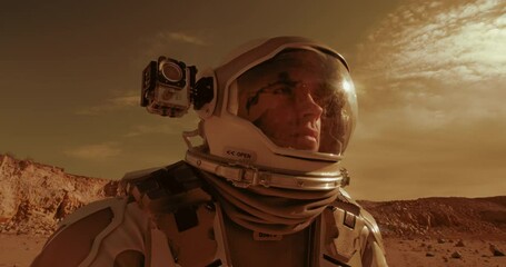 Wall Mural - Male astronaut admiring terrain of Mars