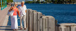 © Darren Baker - Happy Senior Couple Walking By The Sea in Tropical Resort Panorama