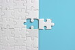 © Hasim Ramle - Jigsaw puzzle with missing piece. Missing puzzle pieces. Concept image of unfinished task. Completing final task, missing jigsaw puzzle pieces and business concept with a puzzle piece missing. blue