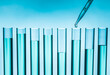 © Tetra Images - Pipette dropping liquid into test tube