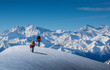 © Tetra Images - France, Haute Savoie, Chamonix, Climbers ascending snowy slope in area of Mont Blanc