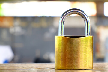 Poster - Padlock on table background and business security concept, protecting data personal information