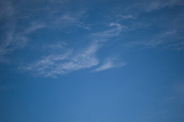 Beautiful dark blue sky with white clouds