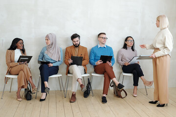 Poster - Recruitment manager explaining job interview process