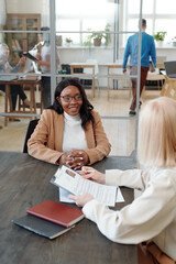 Poster - Meeting with young black job candidate in office