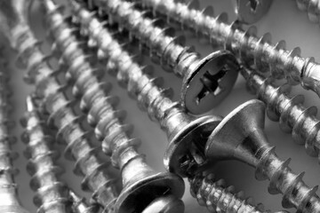 Poster - Metal screws over technical drawing close-up