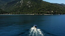 Fishing Boat Sailing On The Sea Back To The Port Of Moscenicka Draga In Croatia. - Aerial Shot