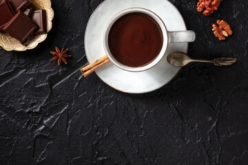 Hot chocolate, shot from the top with a place for text on a black background