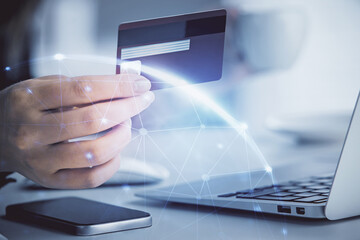 Poster - Multi exposure of woman on-line shopping holding a credit card and social network theme drawing. Relationship E-commerce concept.