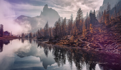 Fotobehang - Wonderful foggy autumn landscape. View on Federa Lake early in the morning at autumn during sunrise. Federa lake. Dolomites Alps. Amazing wild nature. Best famouse hiking locations. Great nature scene
