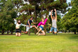 © Spectral-Design - Happy friends jumping in the park
