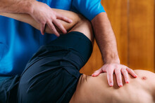 Discus Hernia Manual Massage Treatment. Physical Therapist Massaging Lower Back.