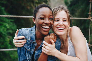 Happy women hugging each other