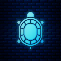 Sticker - Glowing neon Turtle icon isolated on brick wall background. Vector