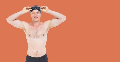 Wall Mural - Composition of male swimmer with copy space isolated on orange background