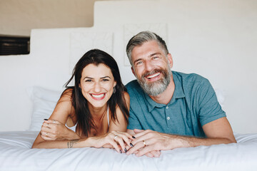 Wall Mural - Couple spending their honeymoon in bed