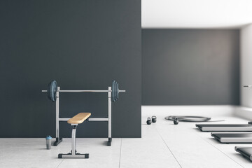 Grey gym interior with empty mockup space, equipment and daylight. Mock up, 3D Rendering.