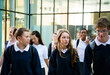 © Rawpixel.com - Group of students walking in school