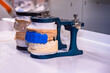 Articulator for teeth modeling. Dental articulators fixed dentures. Die-cast aluminum anatomical articulator. Dental equipment. Dentistry tools development of prostheses. Equipment dental prosthetist