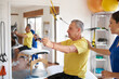 © PER Images/Stocksy - Healthcare: Senior man receiving rehab treatment with a physiotherapist