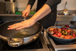 © Hernandez & Sorokina/Stocksy - Close Up Of Anonymous Chef Working