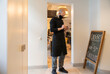 © Hernandez & Sorokina/Stocksy - Chef Using Smartphone At Restaurant