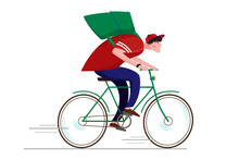 A Courier On A Bicycle. A Courier With A Backpack Rides A Bicycle Fast. A Man In A Baseball Cap, Red T-shirt And Blue Trousers Rides A Green Bicycle