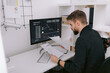 © Oleksii Syrotkin/Stocksy - Male broker analyzing documents in office