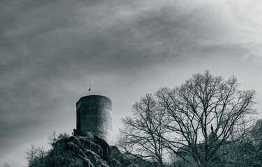 castle tower on top of a hill
