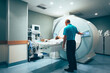© Image Supply Co/Stocksy - CT scanner with patient and radiologist