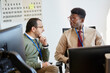 © ALTO IMAGES/Stocksy - Co-worker businessmen talking