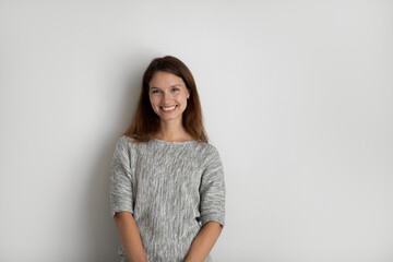 Portrait of happy beautiful woman on grey studio background isolated, excited young female with healthy toothy smile looking at camera, natural beauty, confident businesswoman posing for photo