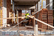 © Bisual Studio/Stocksy - Builder in protective mask working on construction site