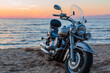 motorcycle on a sandy beach on the background of the sea