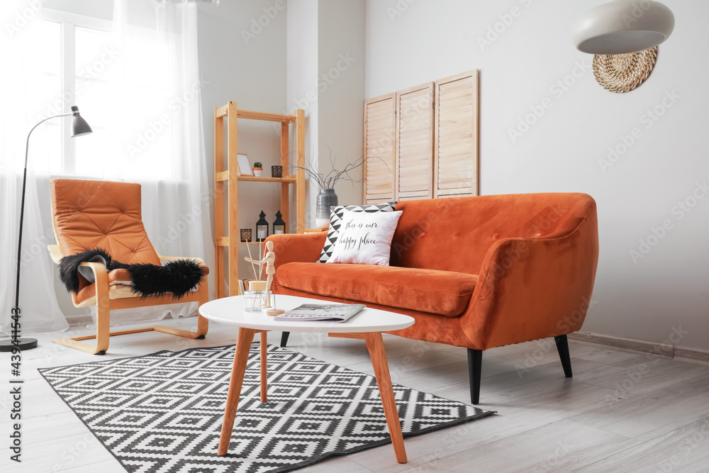 Interior of living room with stylish sofa