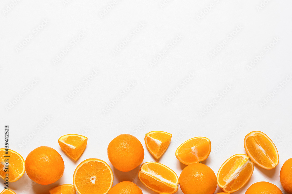 Juicy oranges on light background