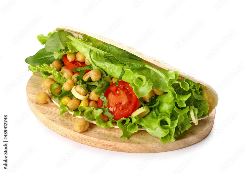 Board with tasty vegetarian taco on white background