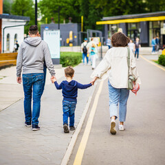 Abstract family walking in the park. Concept of modern City life, lifestyle. Regular people out in public places