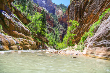 River flowing through a canyon with colorful rocks