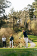 © Sergio Marcos/Stocksy - Women playing golf in park