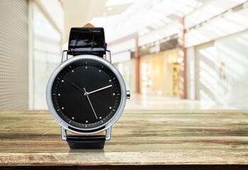 Wall Mural - The vintage wristwatch model black on a background