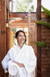 © Trinette Reed/Stocksy - Woman at a luxury spa