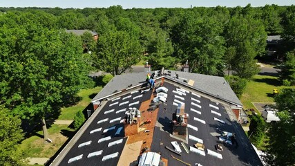 Wall Mural - Roofer repair replace shingle that has been damaged and needing replacement