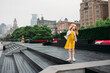 © Amanda Voelker/Stocksy - A little girl and a little boy on a platform in shanghai