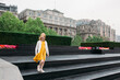 © Amanda Voelker/Stocksy - A little girl walking down steps on the Bund in Shanghai